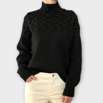 Sweter damski z ozdobnym splotem kablowym