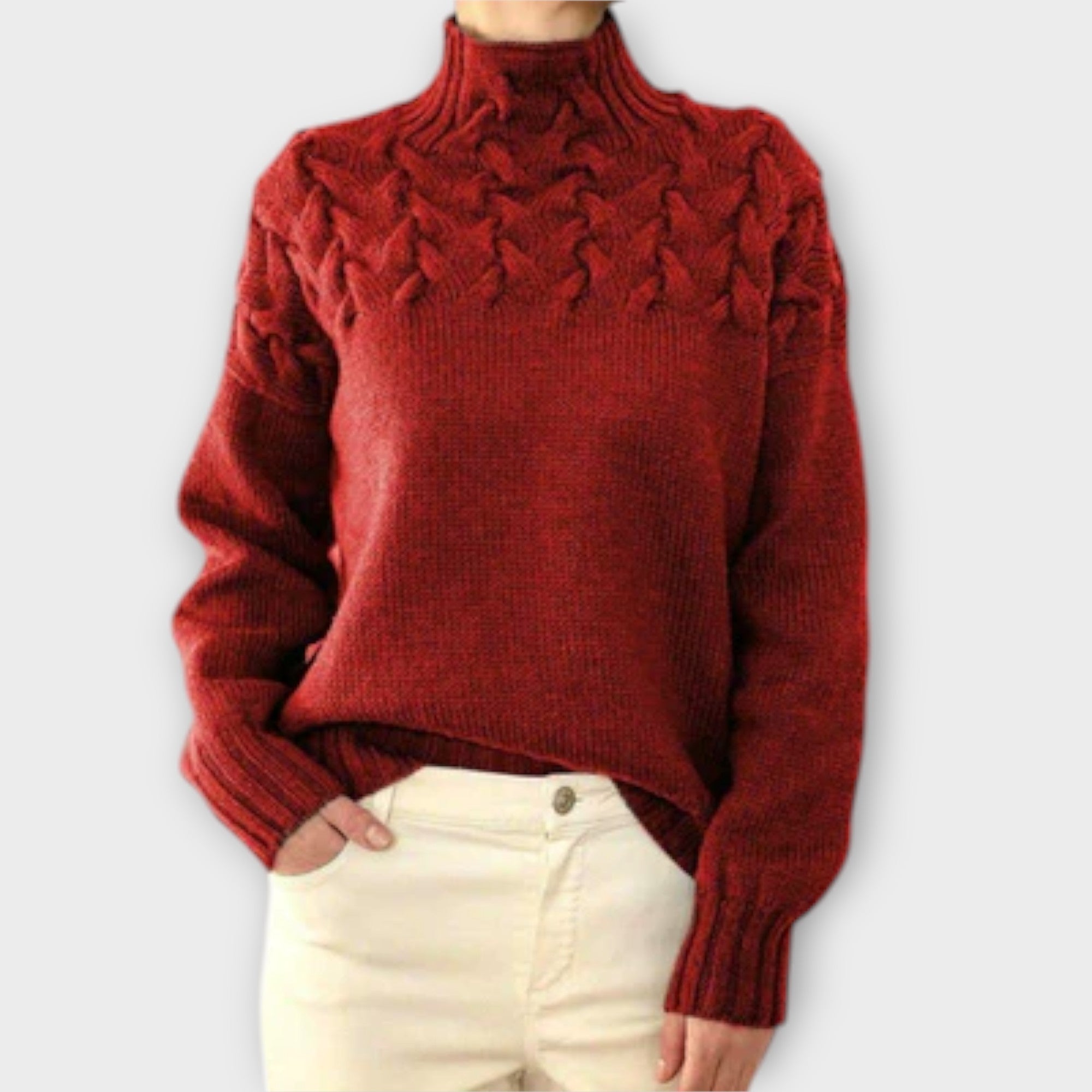 Sweter damski z ozdobnym splotem kablowym