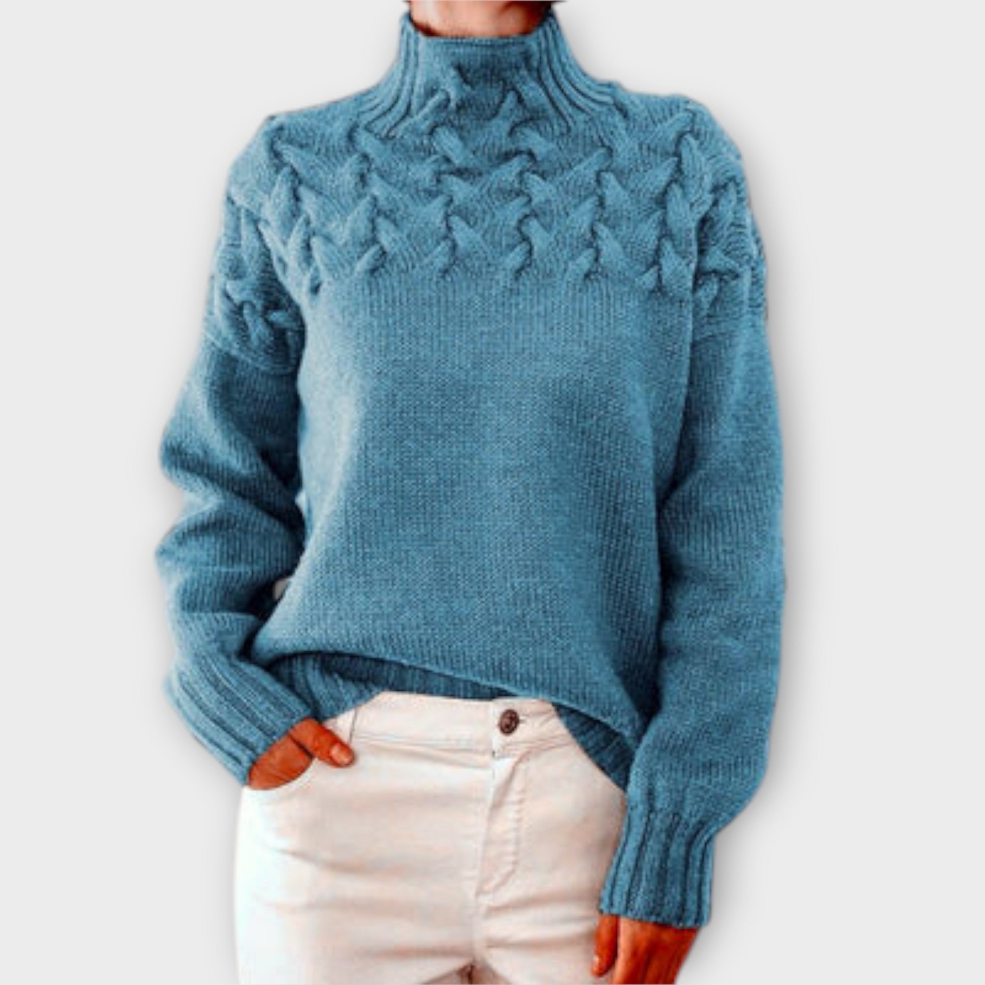 Sweter damski z ozdobnym splotem kablowym