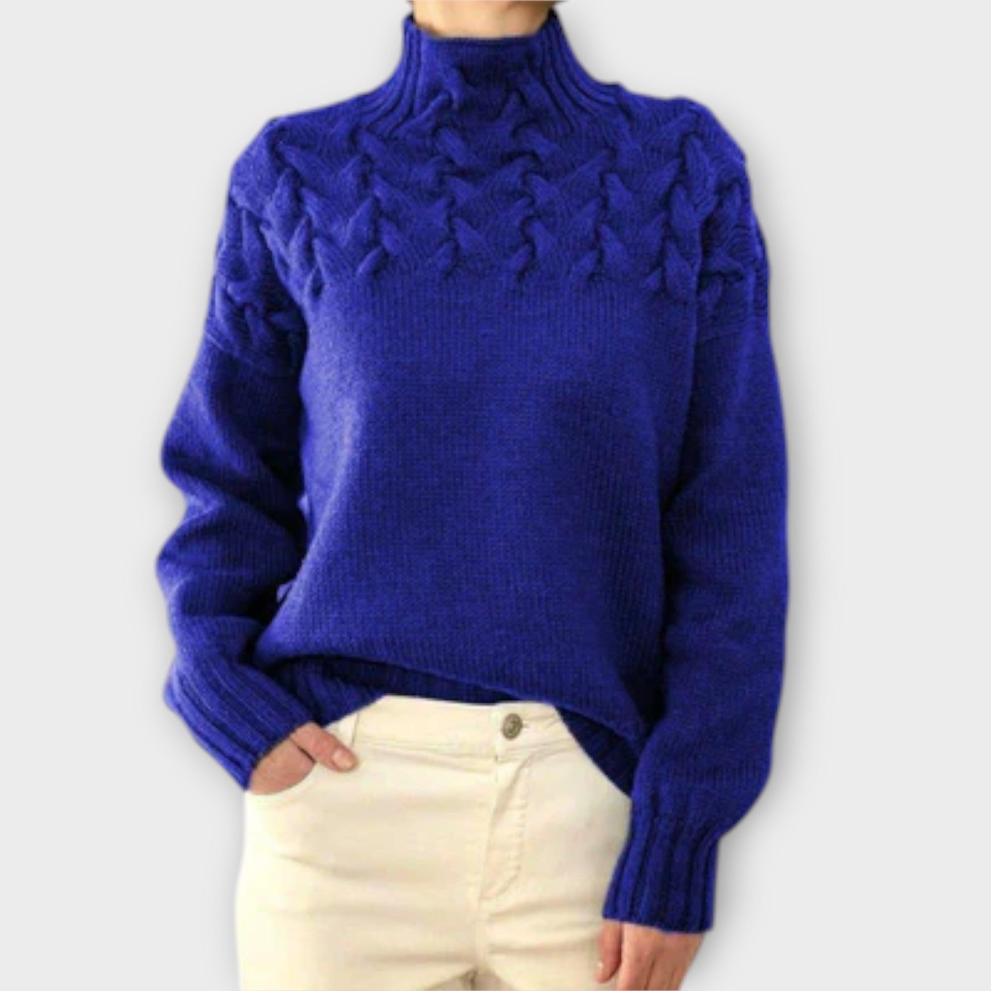 Sweter damski z ozdobnym splotem kablowym